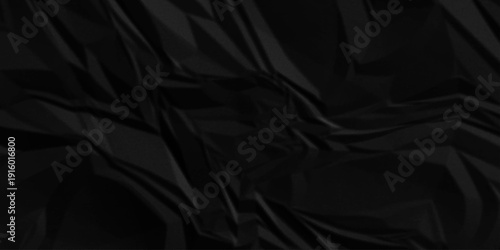Black paper wrinkled texture for background space. Rough black paper. Paper texture, recycled creased paper background.