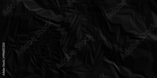 Black paper wrinkled texture for background space. Rough black paper. Paper texture, recycled creased paper background.