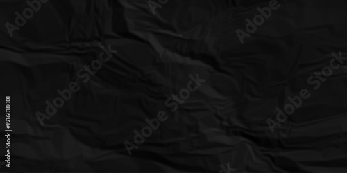 Black paper wrinkled texture for background space. Rough black paper. Paper texture, recycled creased paper background.