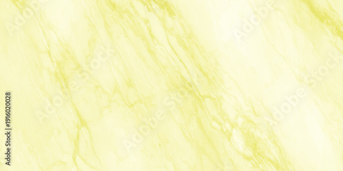 a close up of a yellow marble surface with white and light streaks throughout the stone