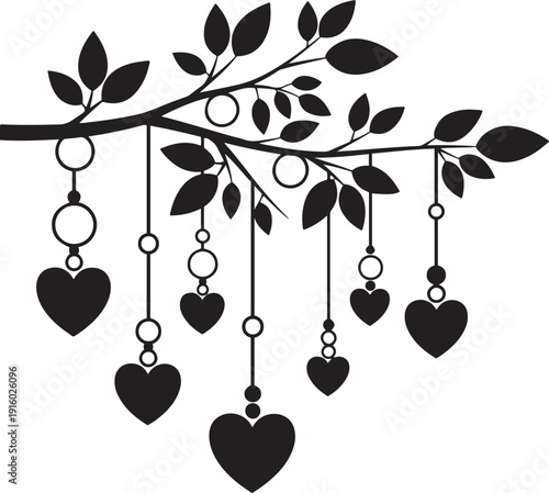 Black silhouette of a tree branch with leaves and hanging heart ornaments love