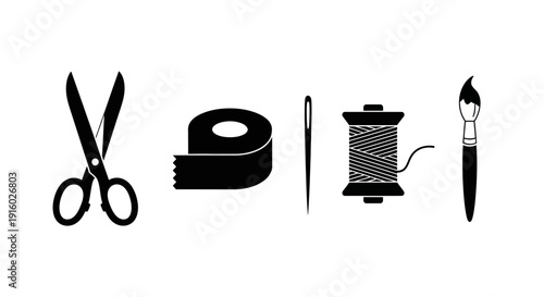 Set of sewing and crafting tools including scissors tape needle thread and brush.