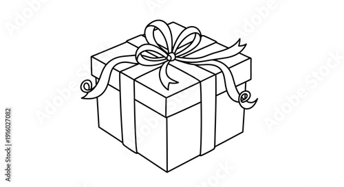 Simple gift box with ribbon and bow ready for celebration and giving.