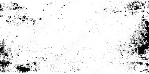 Distressed white grunge texture with black grit and grainy noise vintage weathered featuring a white background with sparse black distressed elements.