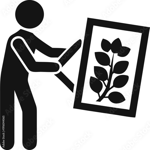 An individual carrying a framed depiction of a leafy branch, symbolizing botany and domestic embellishment
