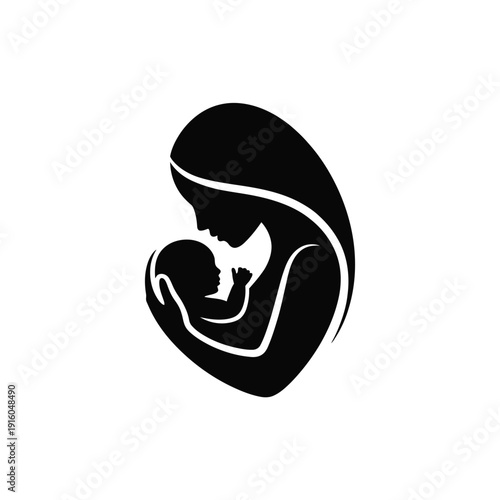 A mother tenderly holding her newborn baby in a loving embrace