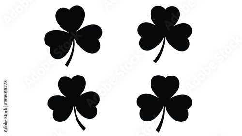 Four black clover shapes against a white background silhouette