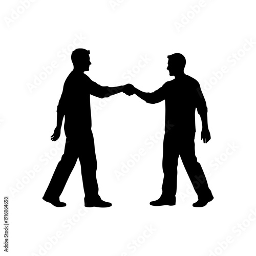 Silhouette of two men fist bumping in agreement.
