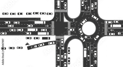 Busy city intersection with a roundabout and traffic lights.