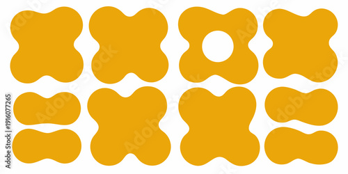 Abstract arrangement of golden yellow butterfly like shapes on a white background