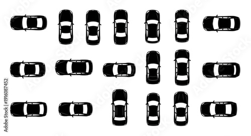 Top view of many black cars parked in a lot.