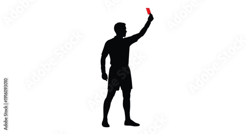 Referee displaying a red card during a sporting event silhouette