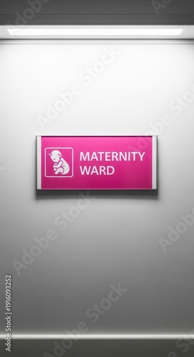 Vivid Pink Maternity Ward Sign Illuminated on Hospital Wall, Signage and Medical Concept