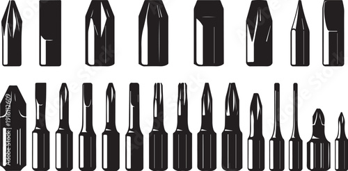 Collection of various screwdriver bits on white background