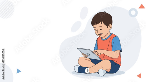 Young boy happily using a tablet computer, sitting cross-legged on white background
