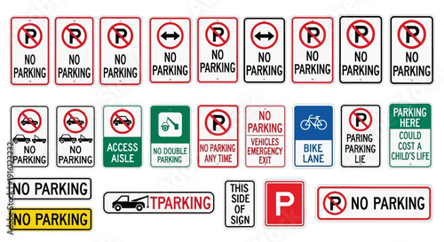 The image displays various parking and traffic signs arranged in rows on a surface.