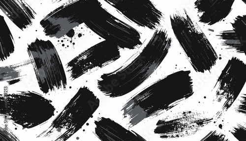Abstract black brush strokes on white background viewed from directly above showcasing dynamic artistic expression