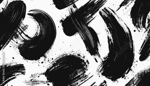 Dynamic black brush strokes creating an abstract artistic pattern on a clean surface from a close-up viewpoint