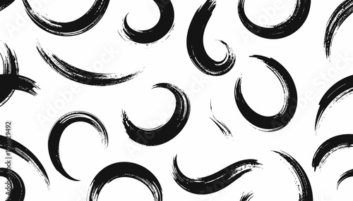 Abstract black brush strokes pattern on white background, viewed from directly above, illustrating artistic creativity and design elements in a graphic illustration