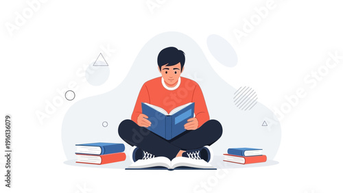 Young man sitting cross-legged reading a book, surrounded by books.