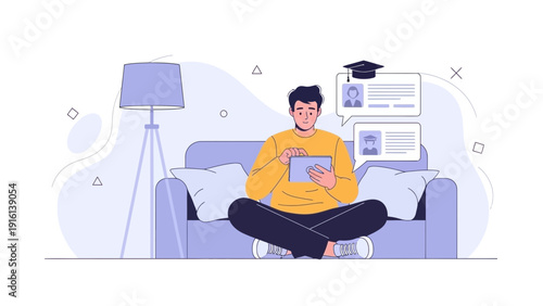 Young man using tablet computer for online education on sofa at home
