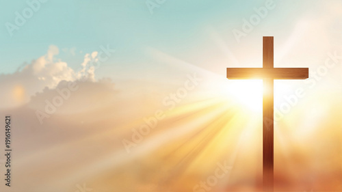 Christian cross silhouette against a bright sunlit sky with divine light rays, spiritual religious concept for hope and faith, peaceful sunrise