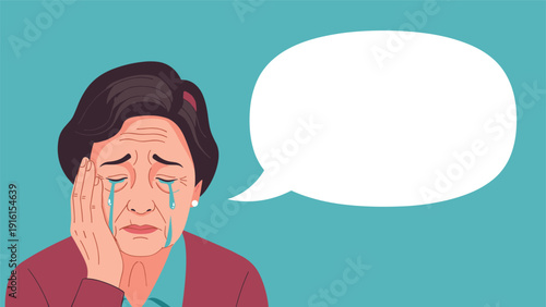 Sad elderly woman crying with tears on her face and her hand on her cheek next to a large empty speech bubble for your custom text.