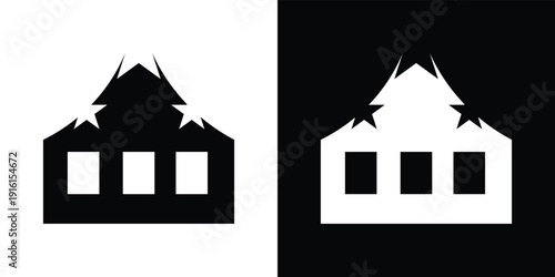 Black and white house with stars on the roof and windows building