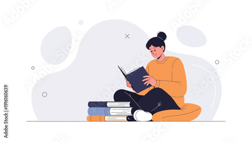 Young Woman Reading Book Sitting Cross-legged on Floor, Stacked Books