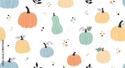 Charming autumn seamless pattern depicts various colored pumpkins, fall leaves, and colorful dots on a white background.