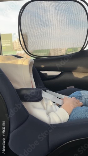 Toddler Sleeping Peacefully in Car Seat