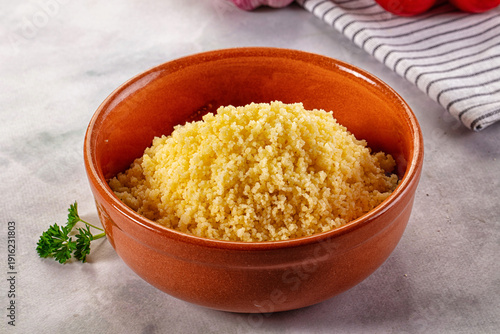 Fotografie Boiled wheat couscous grain garnish