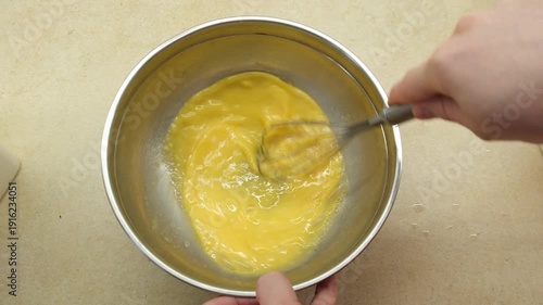 Whisking Eggs in Metal Bowl