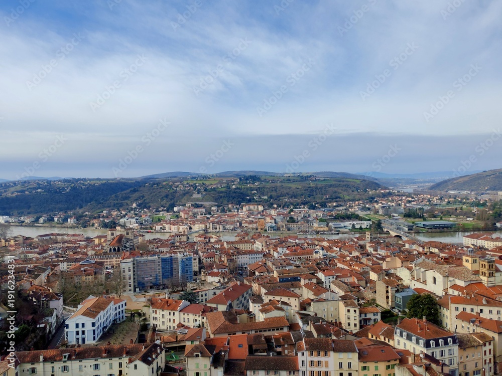 Obraz premium Vienne,France -Febrary 15,2026: An aerial view of Vienne from hill of Pipet. View to the bridge de lattre de masini vienne