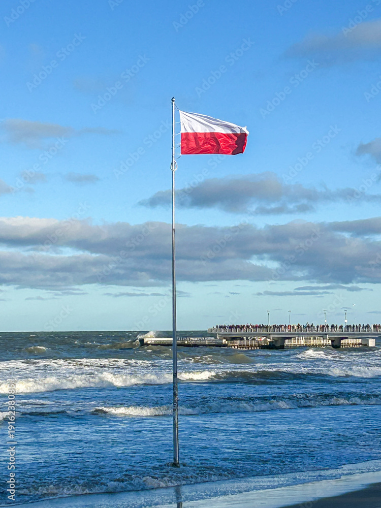 Fototapeta premium Polish Flag at Kołobrzeg Pier