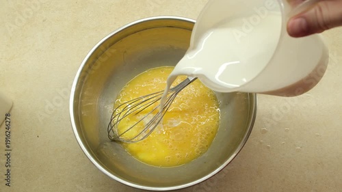 Whisking Eggs in Metal Bowl