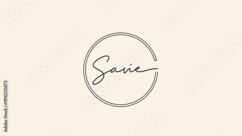 Elegant handwritten script logo inside a circular frame.