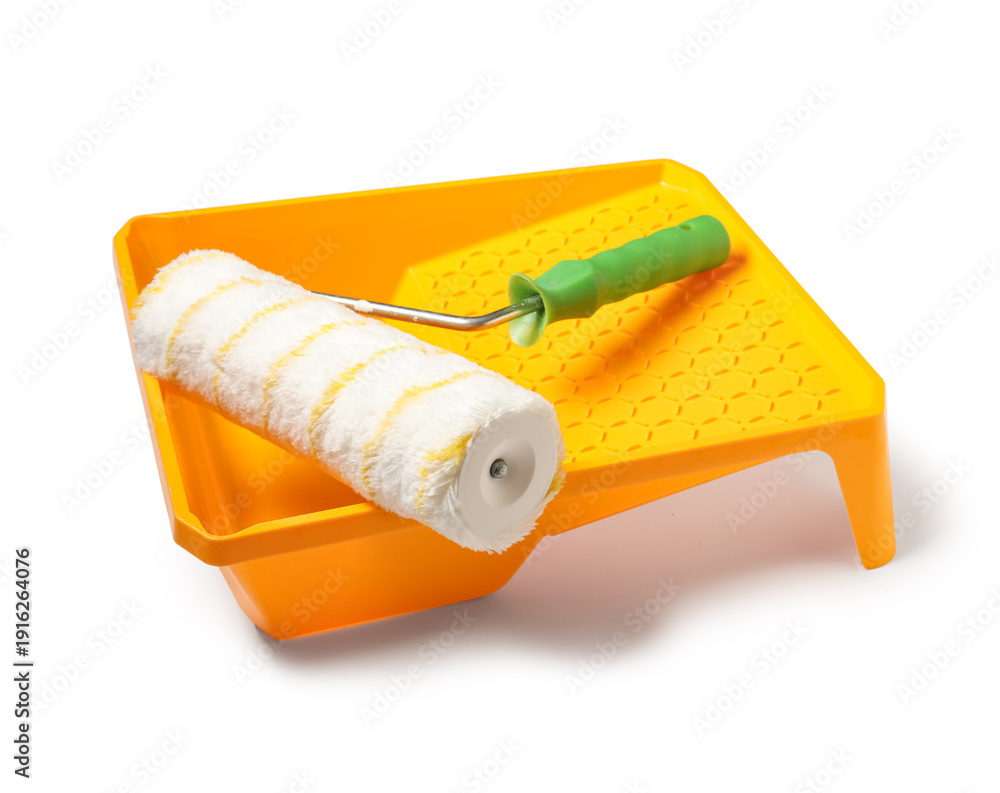Obraz premium Paint roller with tray on white background