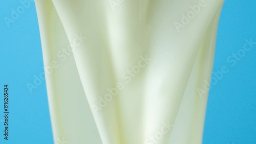 Abstract Macro Texture of Natural Yogurt in Slow Motion