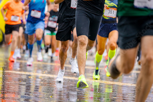 Large group of athletes running marathon