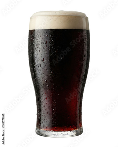 Dark stout beer glass with foam isolated. Cold alcoholic beverage.