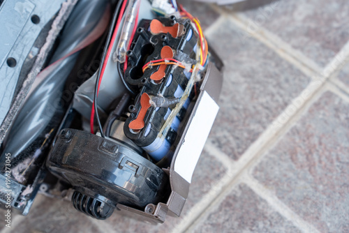 Close-up, Top view,  Repair or replacement battery of vacuum cleaner