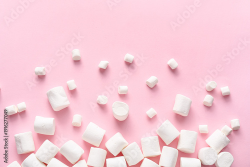 Sweet marshmallows on pink ...