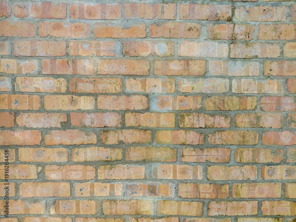 Obraz premium Rustic Red Brick Wall Texture Background with Natural Weathering