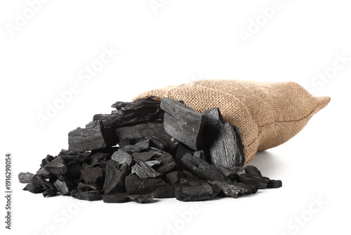 Overturned bag with coal is...