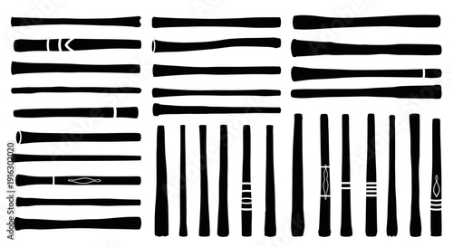 Collection of assorted black paintbrushes on white background for artistic and creative use
