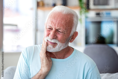 Принти на полотні Senior man with toothache touching his face