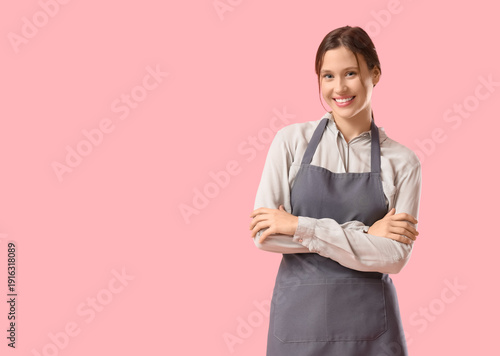 Happy young female barista ...