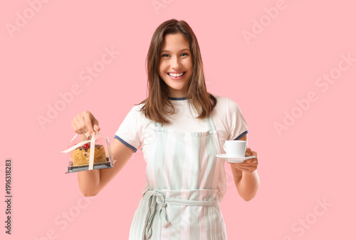 Happy young female barista ...