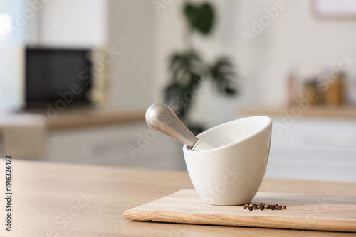 Mortar with pestle and pepp...